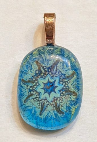 Glass pendant with copper bail